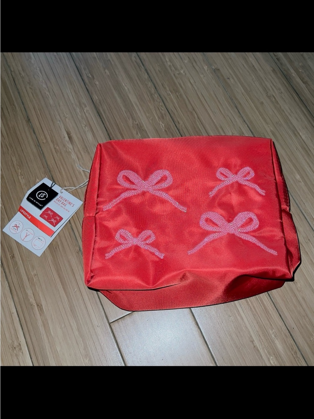 New red cosmetic bag with pink sequin bows